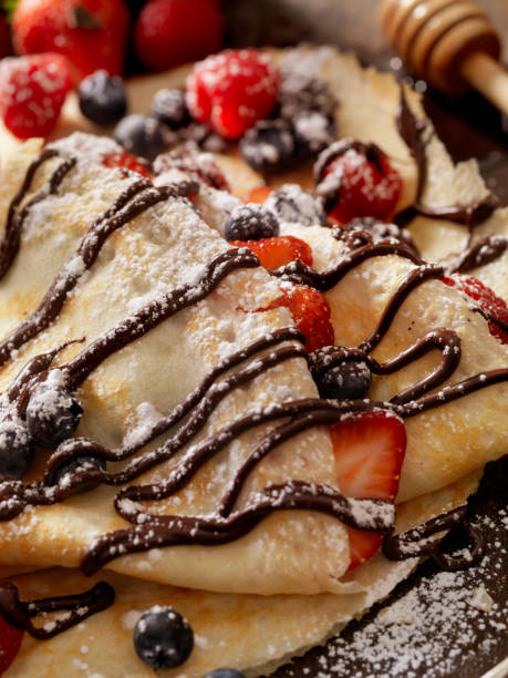 istock Crepes with Chocolate Sauce and Powdered Sugar 811988418