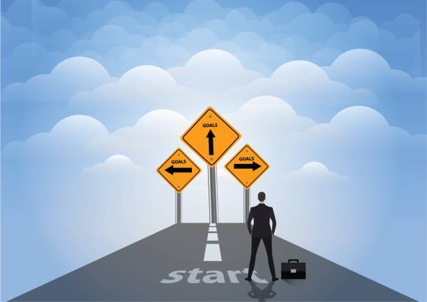 istock Businessman is standing with sign of easy vs hard way on the highway 811992528