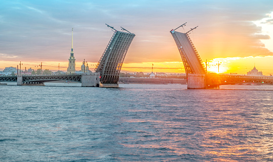 Neva river. Palace Bridge, Rostral Column, Peter and Paul Cathedral. Morning in St.-Petersburg, Russia
