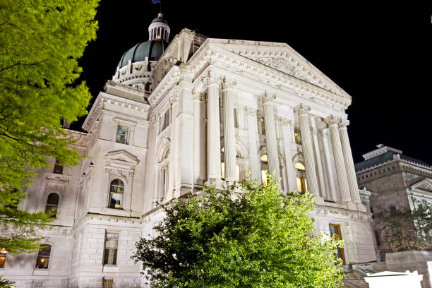istock Indiana capitol building, low view, at night from front 812049886