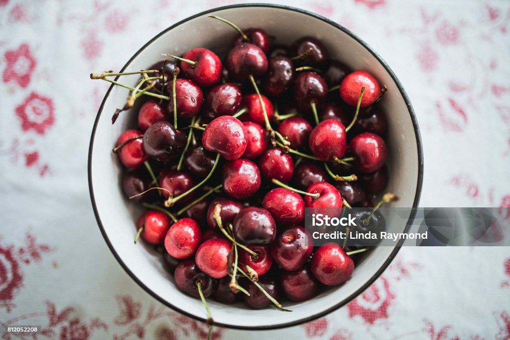 Top view of cherries in a bowl on a table cherry, freshness,fruit, no people, Cherry Stock Photo