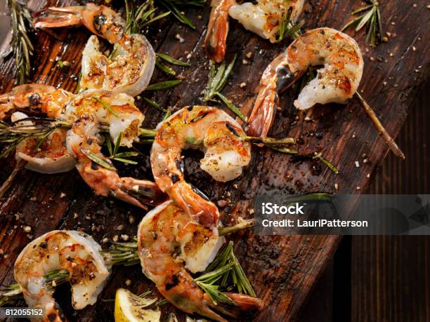 Grilled Shrimp On Rosemary Skewers Stock Photo - Download Image Now - Shrimp - Seafood, Grilled, Barbecue - Meal
