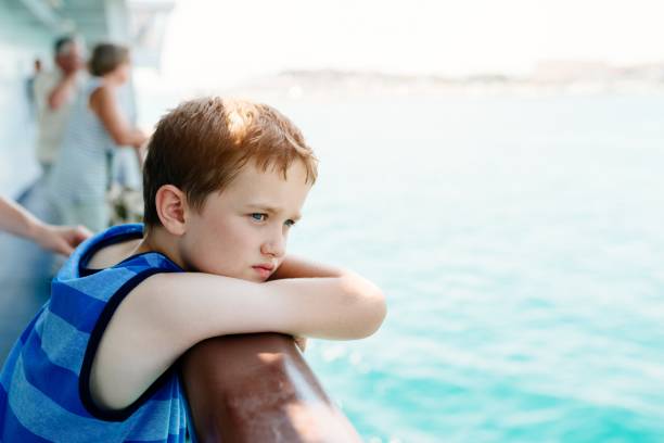 istock Sad thoughtful little boy looking at the sea 812096860