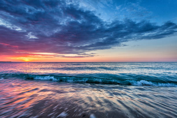 istock Dramatic Tropical Sunrise at the beach 812099778
