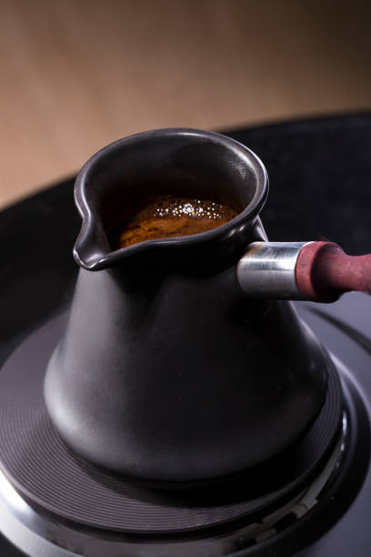 istock Coffee in turk is cooked on the stove 812099948