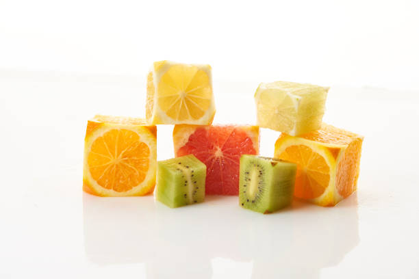 food background of group fruits slices in shape of cubes