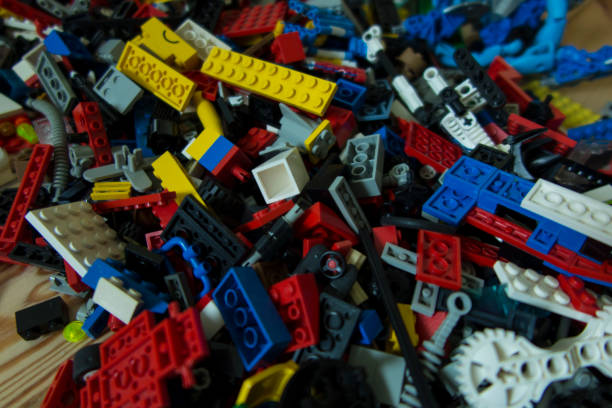 istock Plastic blocks scattered on a wooden floor 812141316