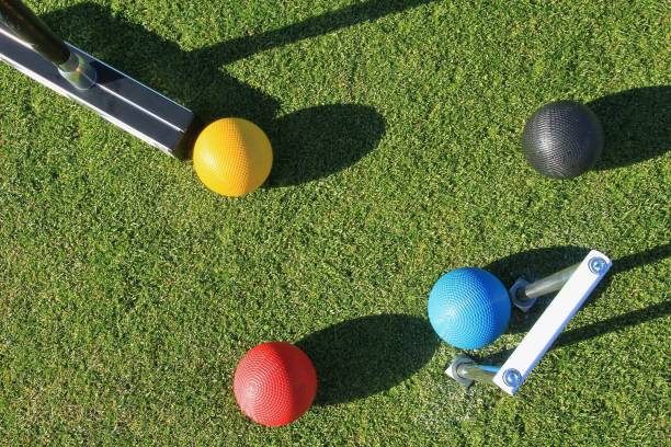 istock Croquet hoop, mallet and four colored balls 812206862