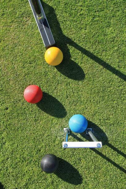 istock Croquet hoop, mallet and four colored balls 812206866