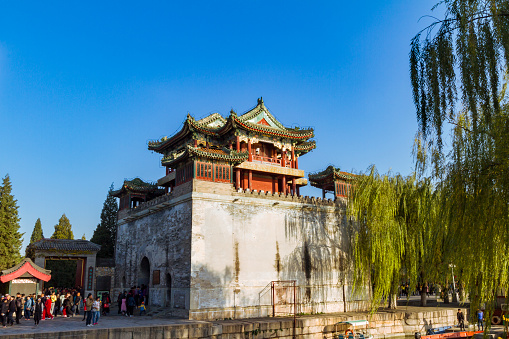 Visitors walking along the Tower of Literary Prosperity, at the Summer Palace park, Beijing.