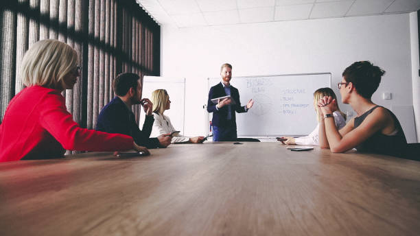 istock Business man presenting new ideas and projects to his team 812214236