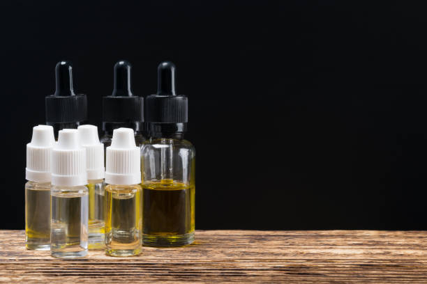 istock Bubbles with liquid for electronic cigarettes in stock on the table 812229272