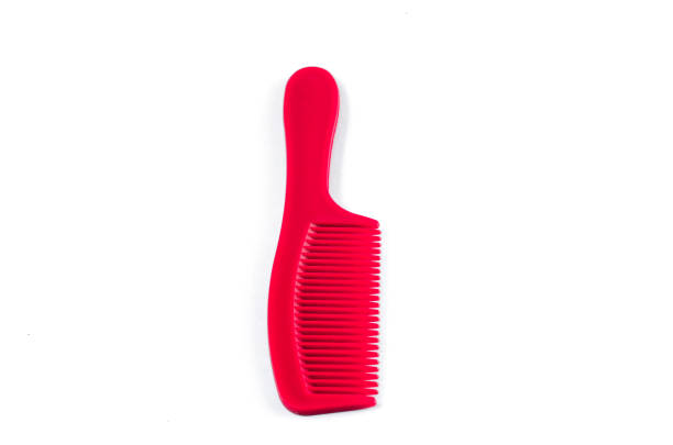 istock Red Hair Comb on white background 812237008