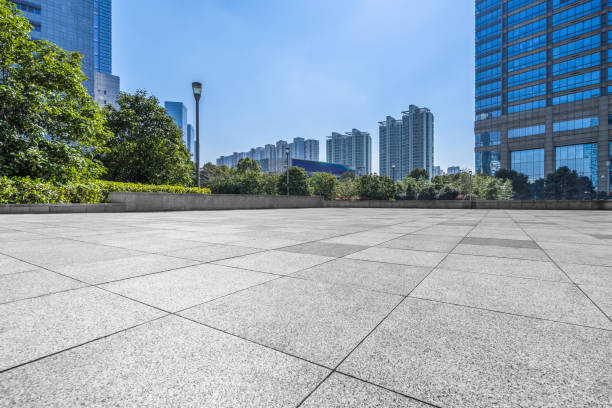 istock Empty pavement front of modern office buildings 812245170