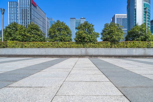 istock Empty pavement front of modern office buildings 812245240