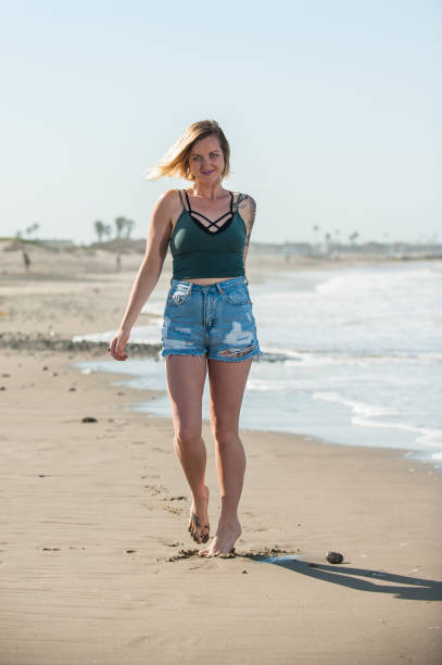 istock Smiling face and denim shorts. 812249900