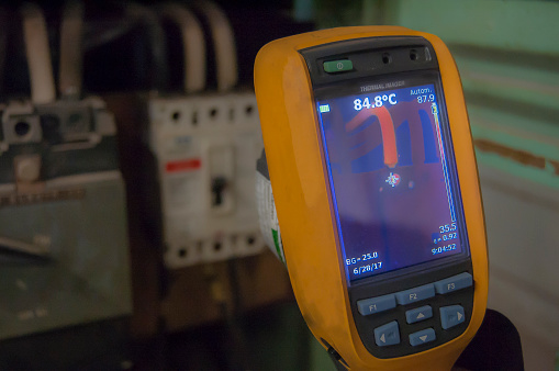 wire and electric circuit breaker with high temperatura detected with infrared thermography camera