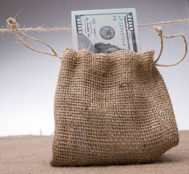 istock Banknote bundle of US dollarin a sack 812284092