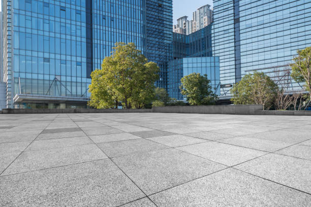 istock Empty pavement front of modern office buildings 812300670