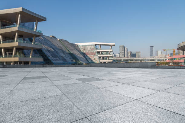 istock Empty pavement front of modern office buildings 812305396