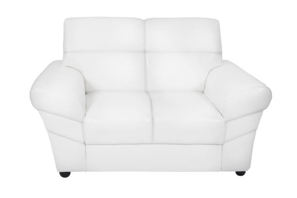 2 つの座席の居心地の良い白い革張りのソファ - two seater sofa ストックフォトと画像