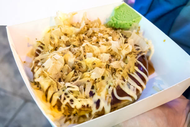 istock Okonomiyaki (Japanese pizza pancake) on paper box 812310358