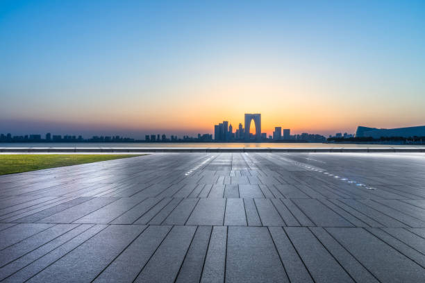 istock Empty pavement and the city skyline 812312570