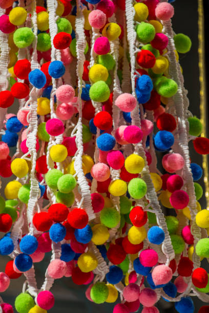 istock Set of colorful  pompoms in the bazaar 812315058