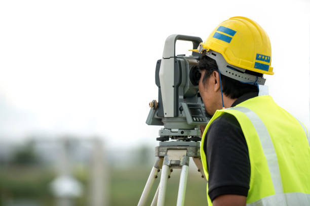 istock survey engineer in construction site use theodolite mark a concrete pile co ordinate 812315262