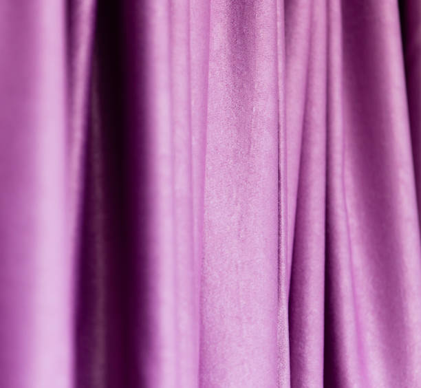 istock Purple cloth on the curtain as a background 812350956