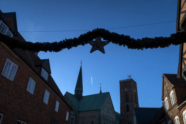 Christmas in Ribe Ribe Cathedral in backlit. Famous Danish landmark at Christmas time. ribe town photos stock pictures, royalty-free photos & images