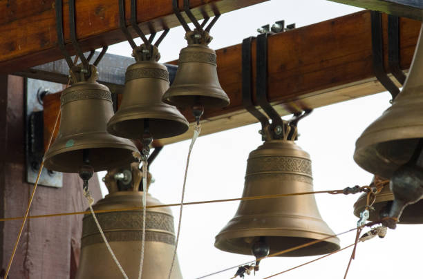 istock Bronze bells on  beam in belfry 812353700