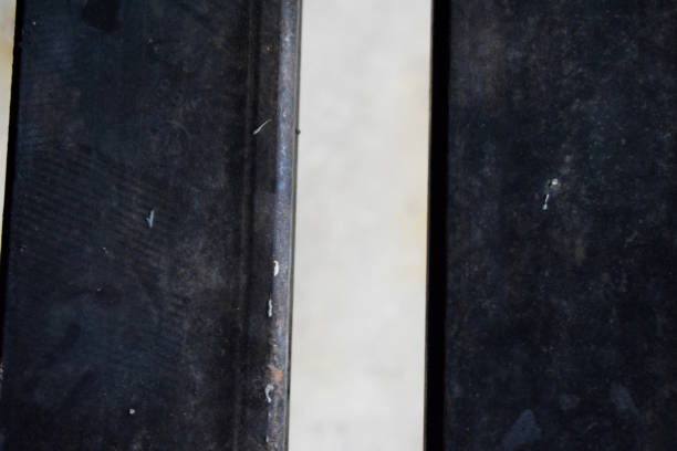 istock Close up of a black painted metal bench 812361410