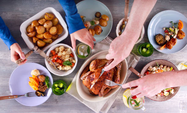 istock Family dinner. Top view people having dinner together 812365806