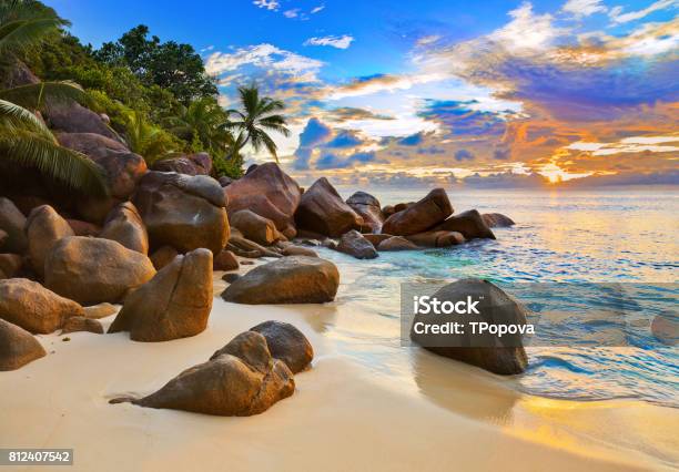 Tropical Beach At Sunset Stock Photo - Download Image Now - Backgrounds, Beach, Breaking Wave