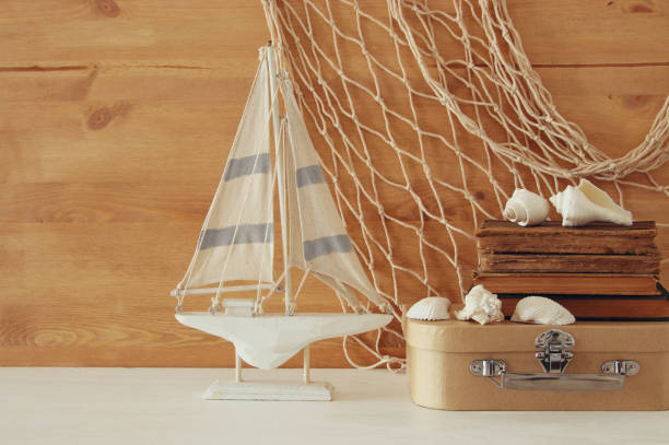 istock Nautical concept with sea life style objects on wooden table 812408168