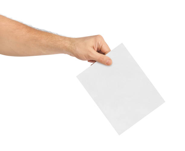 istock Hand with paper ballot 812410758