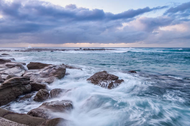 istock Rocky Sunrise Seascape 812416316