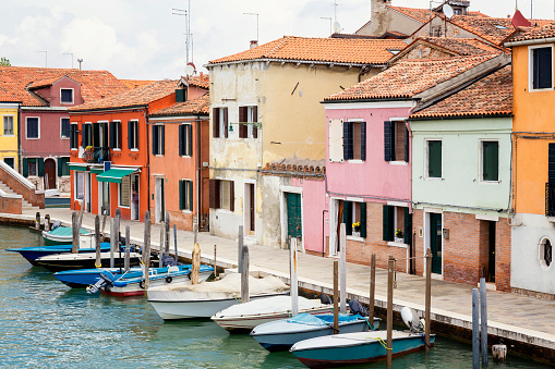 Multi colored houses in Murano at day
