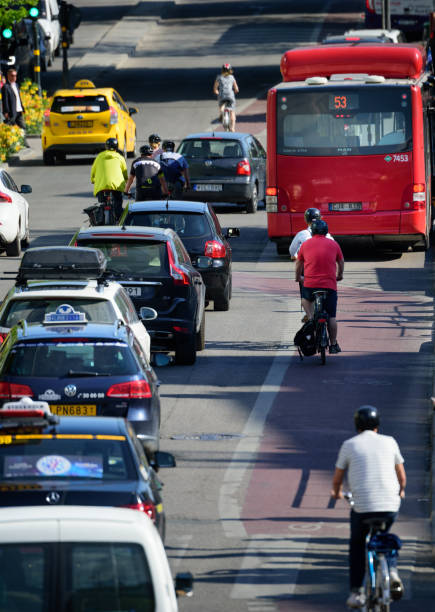 Stockholm, Sweden - May 07, 2016: Commuters om bikes. In traffic. Bike lane on Vasagatan Stockholm a nice spring day.