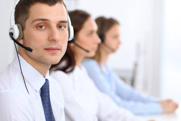istock Young business man in headset. Call center 812441372