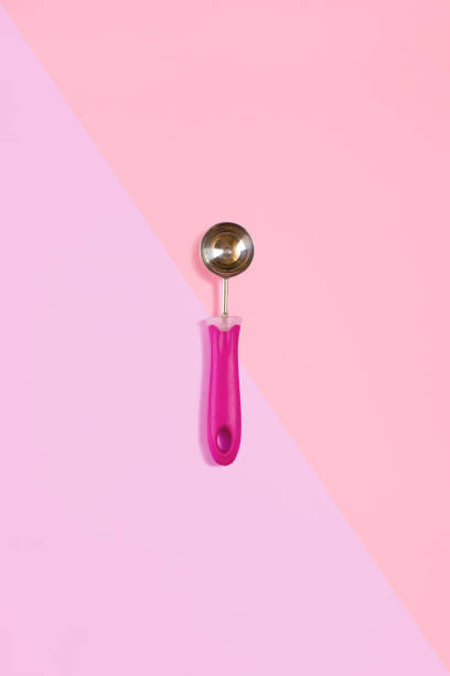 istock Ice cream scoop isolated on pink. Top view 812447172