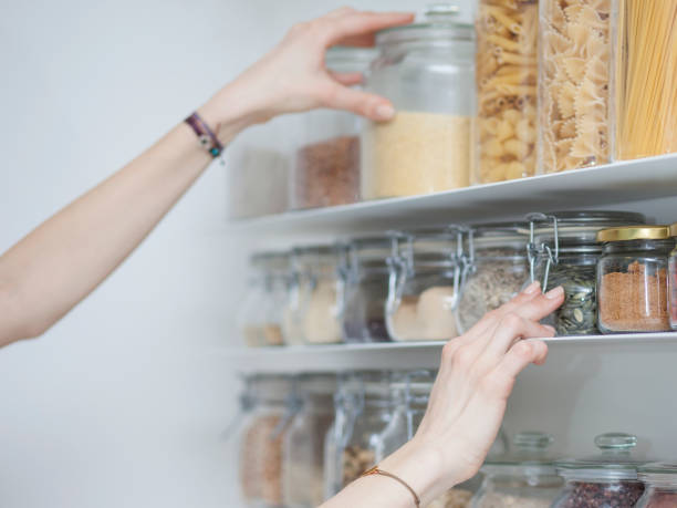 istock Beautiful young  woman breakfast cereals in the kitchen 812451394