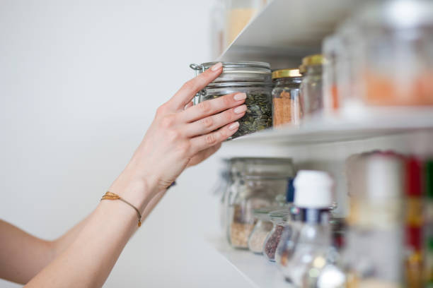 istock Beautiful young  woman breakfast cereals in the kitchen 812451464