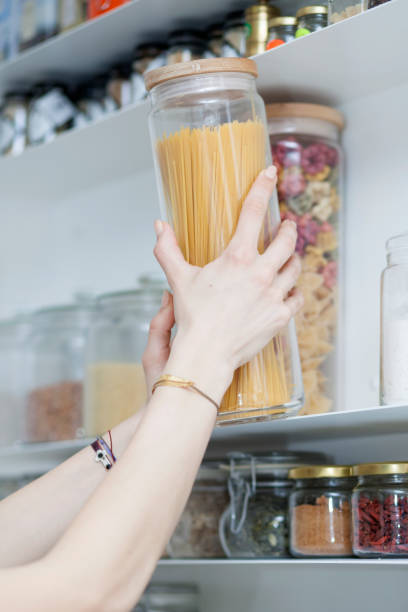 istock Beautiful young  woman breakfast cereals in the kitchen 812451468