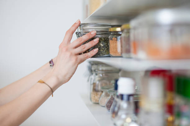 istock Beautiful young  woman breakfast cereals in the kitchen 812451518
