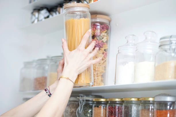 istock Beautiful young  woman breakfast cereals in the kitchen 812451524
