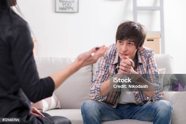 Boy Teenager At A Psychologist Stock Photo - Download Image Now - Teenager, Psychotherapy, Child