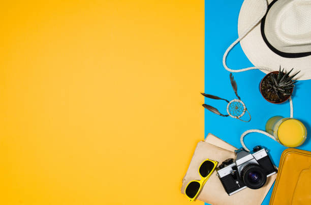 istock Travel accessories top view on colorful background with copy space 812466884