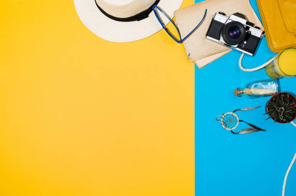 istock Travel accessories top view on colorful background with copy space 812467098
